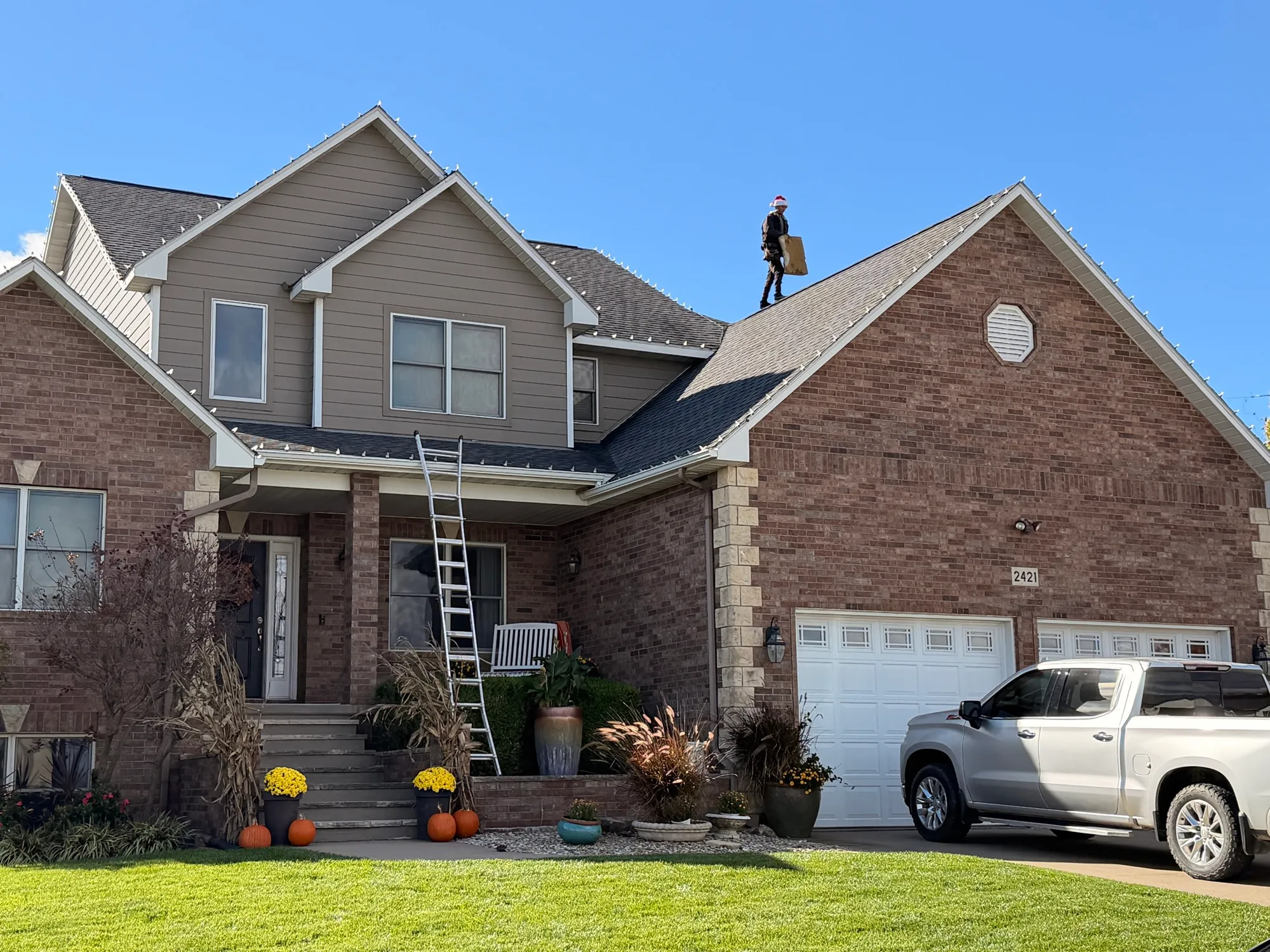 Crew on a two-story roof